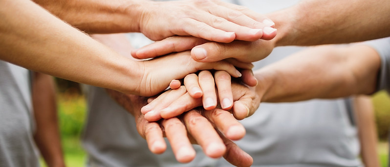 Team hands together